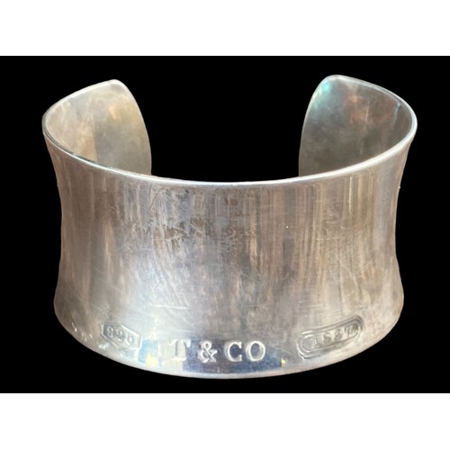 537 - A TIFFANY BROAD SILVER CUFF BANGLE 3cm BROAD STAMPED  TO FRONT 925 T& Co 1837 ALSO STAMPED INSIDE TI... 