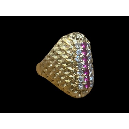 538 - AN 18ct GOLD RING LOZENGER SHAPE ,WOVEN PATTERN 7 CENTRE RUBIES WITH 14 DIAMONDS  SIZE Q 8.33grm