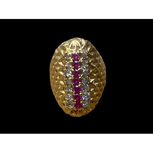 538 - AN 18ct GOLD RING LOZENGER SHAPE ,WOVEN PATTERN 7 CENTRE RUBIES WITH 14 DIAMONDS  SIZE Q 8.33grm