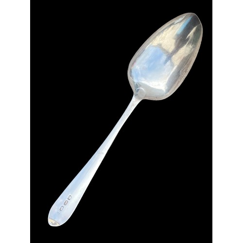 554 - AN IRISH SILVER SERVING SPOON 64.9G BY JOHN POWER DATED 1799