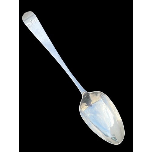 554 - AN IRISH SILVER SERVING SPOON 64.9G BY JOHN POWER DATED 1799