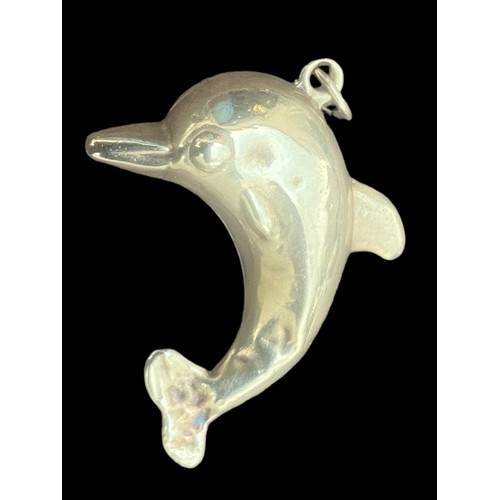 560 - A LARGE 9CT DOLPHIN PENDANT/CHARM (SLIGHT DENT) WEIGHS 2.12G