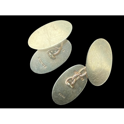 563 - A PAIR OF BEAUITIFUL OVAL 9CT GOLD CUFFLINKS