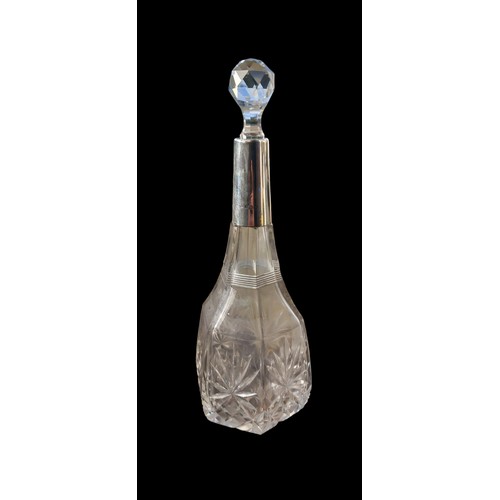 568 - A STUNNING SIVER COLLARED DECANTER OF NEAT PORPORTIONS