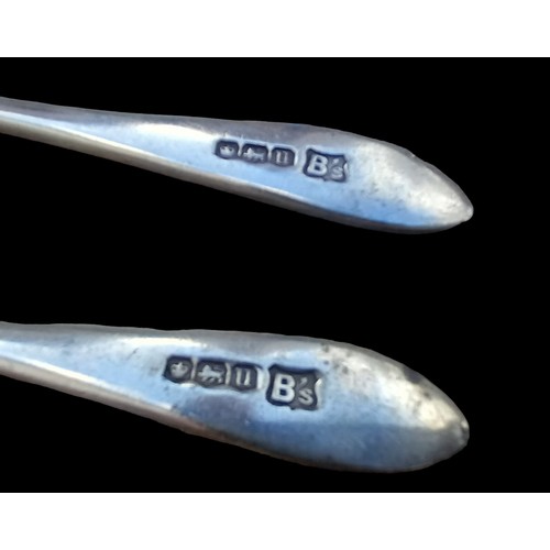 409 - A PAIR OF SHEFFIELD SILVER TEASPOONS