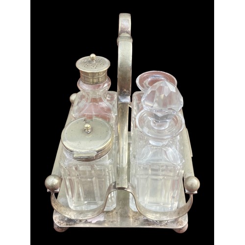 43 - AN ANTIQUE CUT GLASS CRUET SET