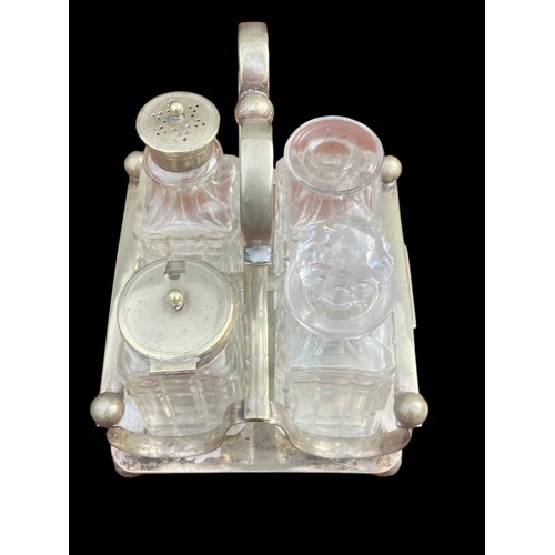 43 - AN ANTIQUE CUT GLASS CRUET SET