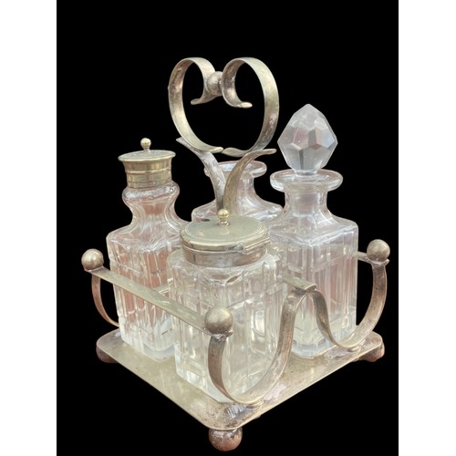 43 - AN ANTIQUE CUT GLASS CRUET SET