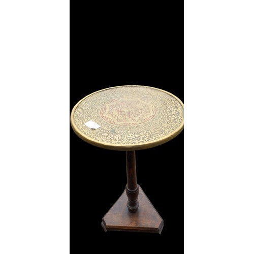 7 - AN INDIAN BRASS TOPPED TABLE