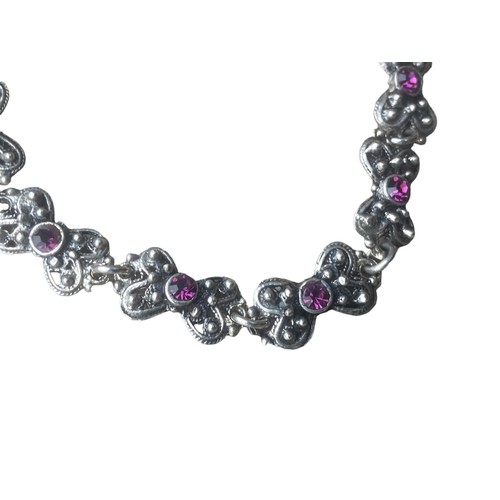 167 - A SILVER BRACELET WITH SQUARE PINK STONES