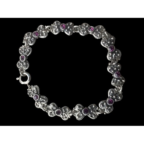 167 - A SILVER BRACELET WITH SQUARE PINK STONES