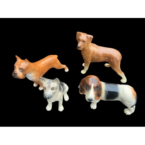 102 - 4 LARGE CERAMIC DOGS TO INCLUDE SYLVAC