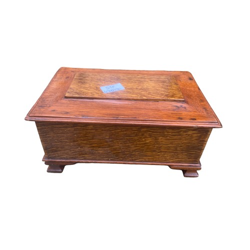 108 - A FIITED OAK BOX ON A BRACKET FOOT