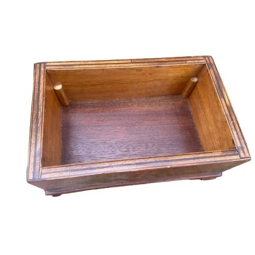 108 - A FIITED OAK BOX ON A BRACKET FOOT