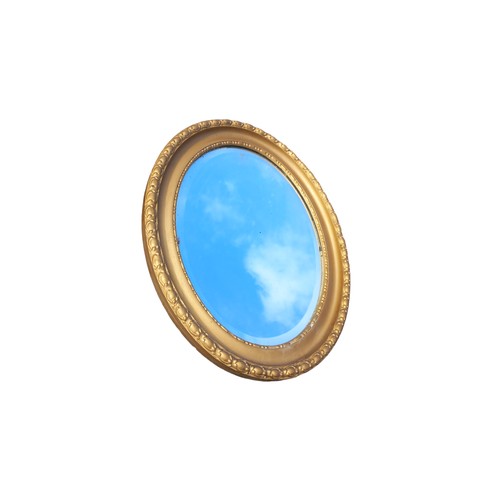 122 - OVAL FRAMED GILT BEVELLED EDGE MIRROR