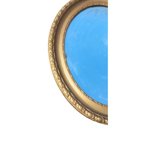 122 - OVAL FRAMED GILT BEVELLED EDGE MIRROR