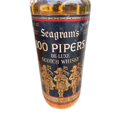 148 - A 1970s 100 PIPERS SCOTCH  WHISKY 70%