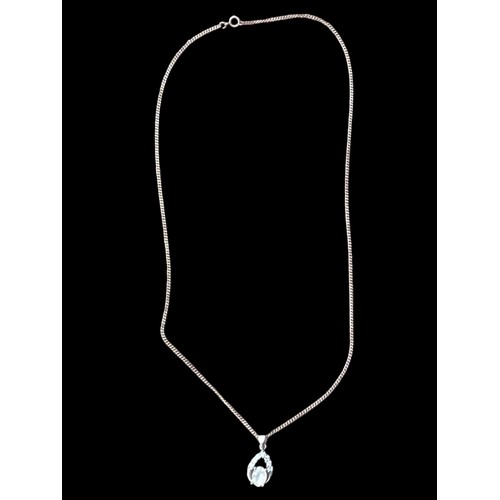 184 - A SILVER DESIGNER STYLE GEM SET PENDANT ON A SILVER CHAIN