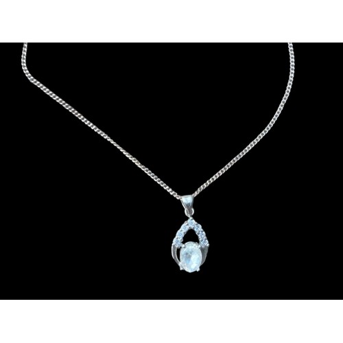 184 - A SILVER DESIGNER STYLE GEM SET PENDANT ON A SILVER CHAIN