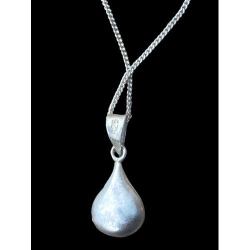 191 - A SILVER DROP PENDANT ON A SILVER CHAIN