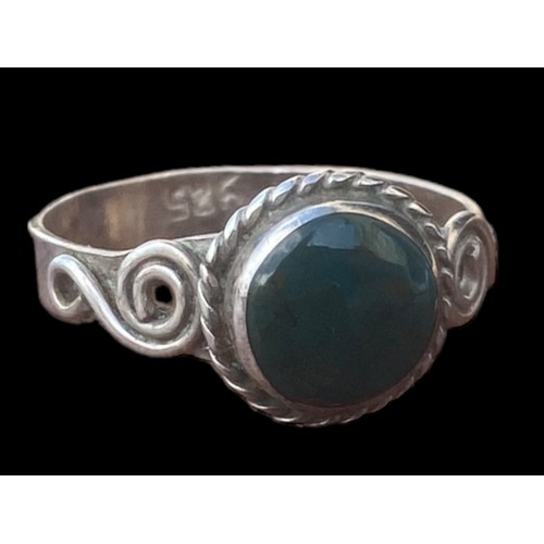 202 - A STUNNING ORNATE NATURAL GREEN STONE SILVER CELTIC RING