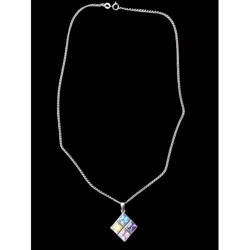 205 - A SILVER PENDANT SET WITH 4 COLOURED STONES ON A SILVER CHAIN