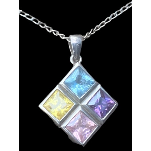 205 - A SILVER PENDANT SET WITH 4 COLOURED STONES ON A SILVER CHAIN