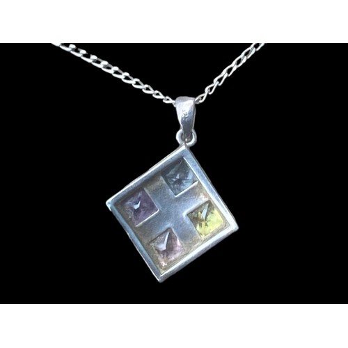 205 - A SILVER PENDANT SET WITH 4 COLOURED STONES ON A SILVER CHAIN