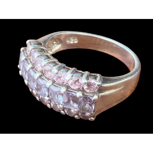 219 - A HEAVY DESIGNER STYLE PINK AND PURPLE STONE RING