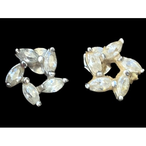 220 - A PAIR OF SILVER EARRINGS SET WITH 5 WHITE STONES