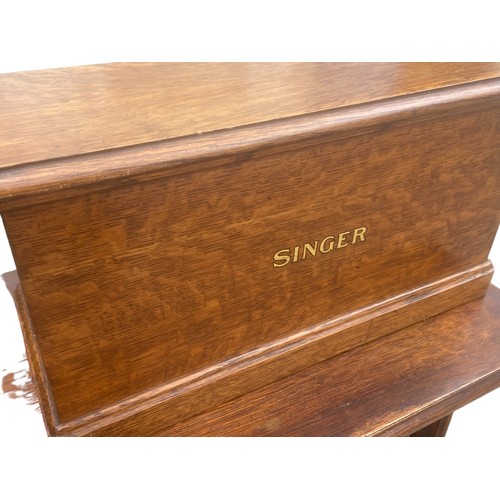 A FULLY RESTORED ORIGINAL SINGER SEWING MACHINE ON AN ORIGINAL OAK BASE ...