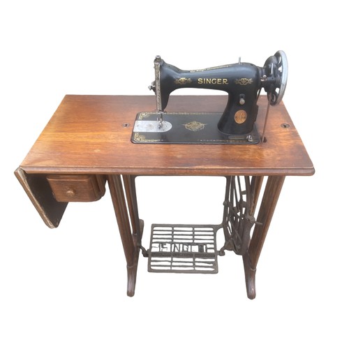A FULLY RESTORED ORIGINAL SINGER SEWING MACHINE ON AN ORIGINAL OAK BASE ...