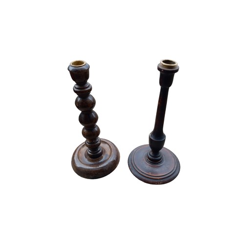 582 - 2 HAND TURNED WOOD CANDLE STICKS