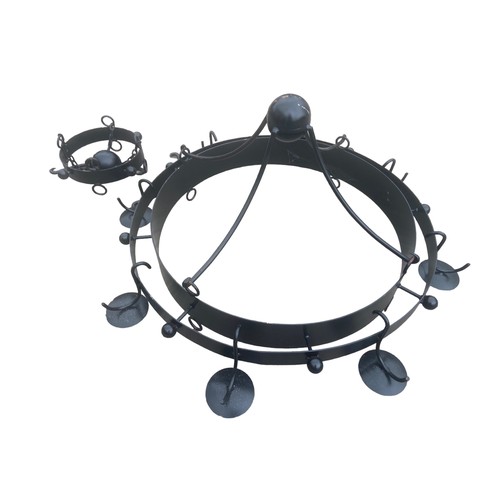 67 - A LARGE BLACK METAL CIRCULAR CHANDALIER STYLE CANDLELABRA