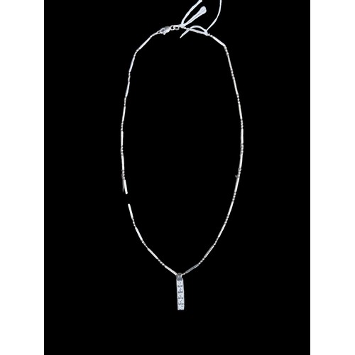 540 - AN 18ct WHITE GOLD HAND MADE RECTANGULAR DROP 5 DIAMOND PENDANT (APPROX 1ct) ON A 16