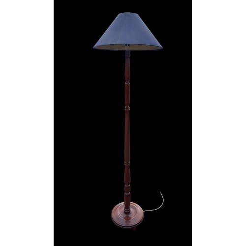 10 - A SOLID MAHOGANY STANDARD LAMP WITH SHADE