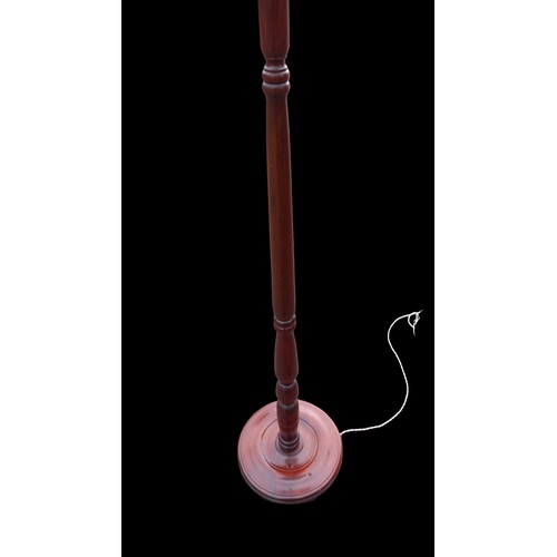 10 - A SOLID MAHOGANY STANDARD LAMP WITH SHADE