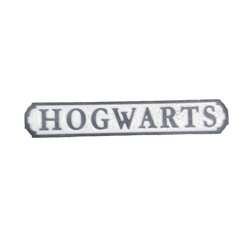 117 - A WOODEN HOGWARTS SIGN 30.5X5.5