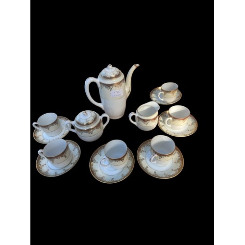 133 - A 15 PIECE HAND PAINTED COFFEE SET BY METO