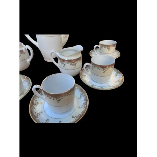 133 - A 15 PIECE HAND PAINTED COFFEE SET BY METO