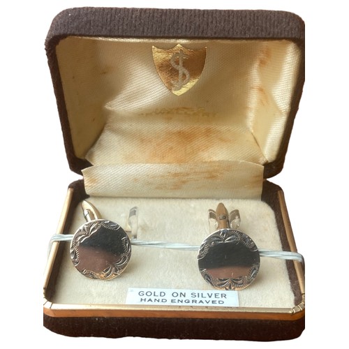 180 - A PAIR OF GOLD ON SILVER CUFFLINKS