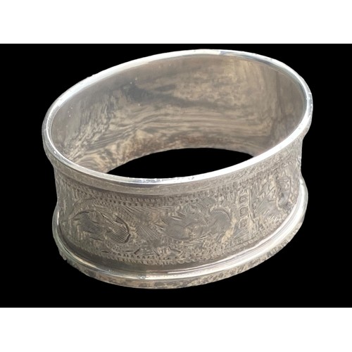 187 - AN ORNATE SILVER NAPKIN RING 14.2grm