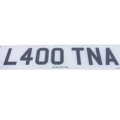 208 - REGISTRATION PLATE L400 TNA