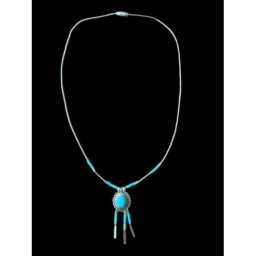 236 - A SILVER NATIVE AMERICAN THEMED NECKLACE SET WITH TURQUOISE