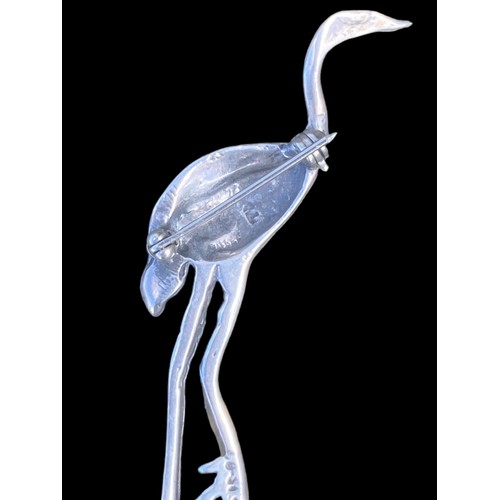 255 - A SILVER STORK BROOCH