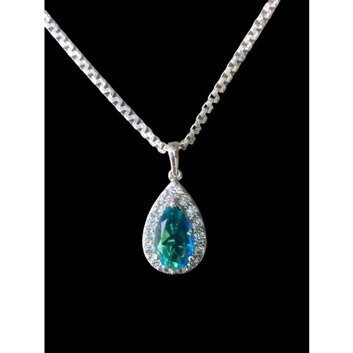 267 - A GEM SET SAWROVSKI CRYSTAL PENDANT ON A FANCY LINK SILVER CHAIN