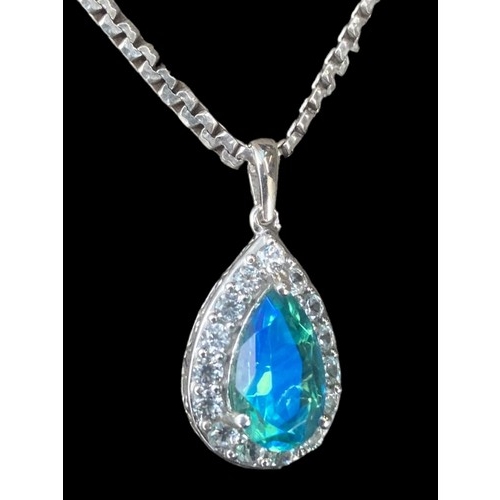 267 - A GEM SET SAWROVSKI CRYSTAL PENDANT ON A FANCY LINK SILVER CHAIN