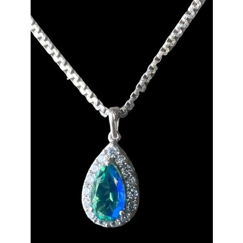 267 - A GEM SET SAWROVSKI CRYSTAL PENDANT ON A FANCY LINK SILVER CHAIN