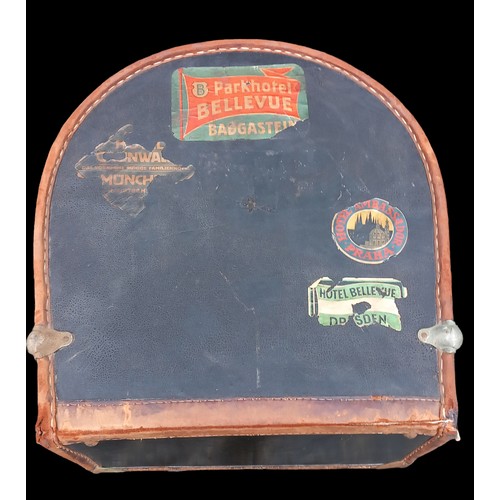 294 - A GENIUNE LEATHER TRAVEL TRUNK WITH VINTAGE LABELS