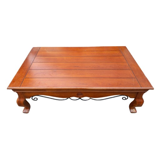 349 - A LARGE MAHOGANY COFFEE TABLE WITH METALWORK TRIM